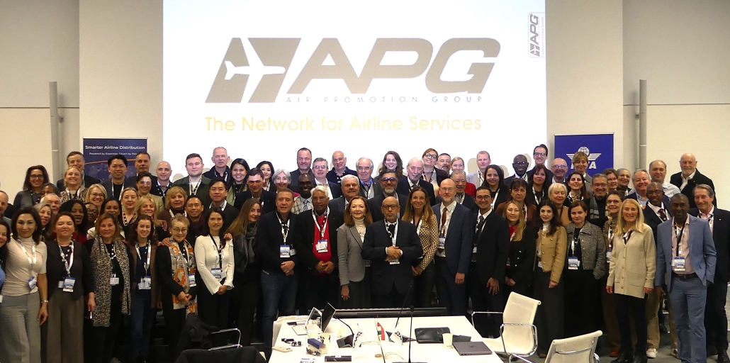 A large group of APG airline network professionals posing together at the 2026 Annual General Meeting (AGM) in Annecy, France